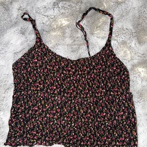 black hollister tank with flower detail